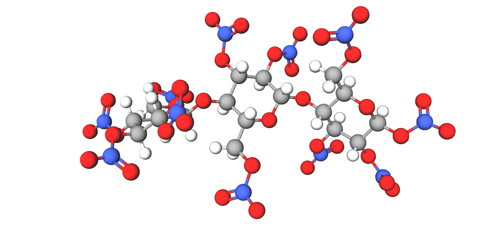 Prikazan je model trinitroceluloze od kuglica i štapića, razgranata struktura koju čine atomi vodika, kisika, ugljika i dušika.
